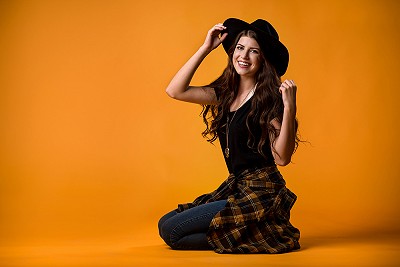 Senior girl in a black hat