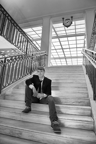 Male senior portrait on steps